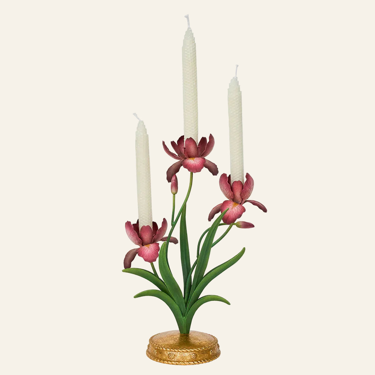 Juliska Meadow Walk three-arm candelabra with crimson iris blooms and ivory taper candles.
