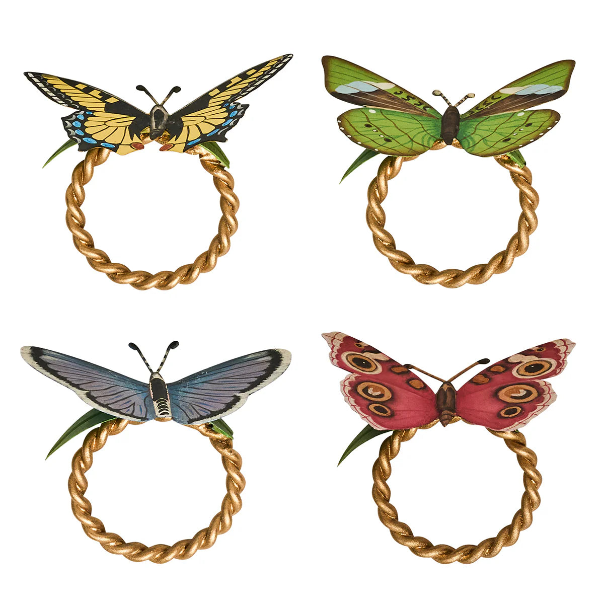 Four Juliska Meadow Walk napkin rings with twisted gold rope bands and butterfly toppers.