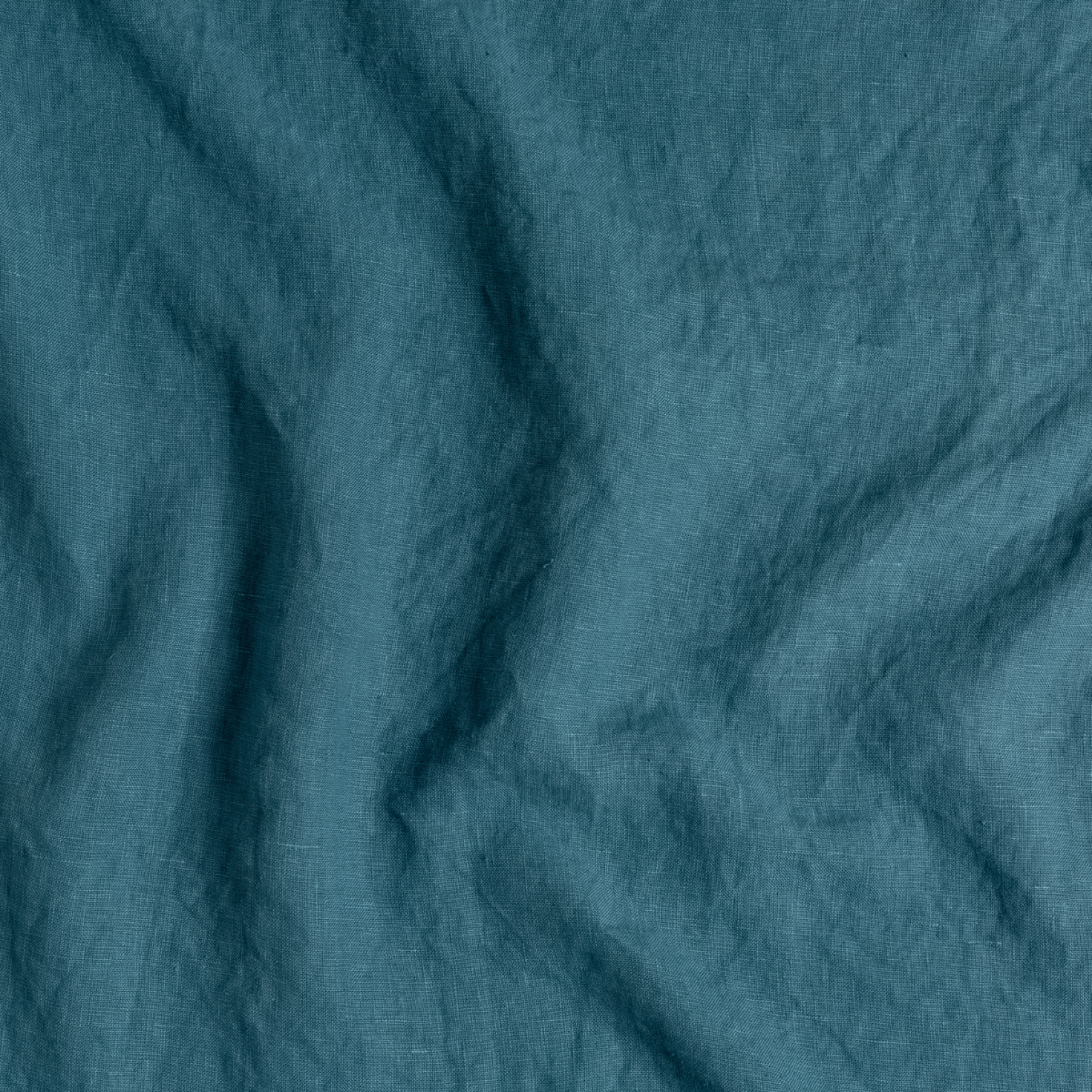Close-up of Cenote linen fabric with soft natural drape and texture.
