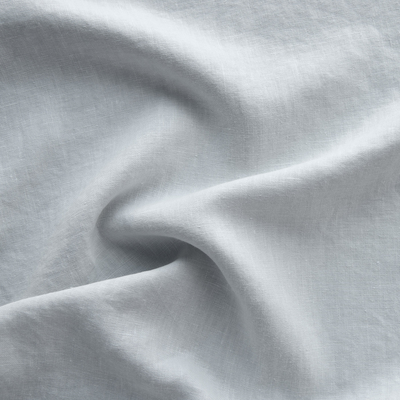 Close-up of Cloud linen fabric showing soft drape and natural woven texture.