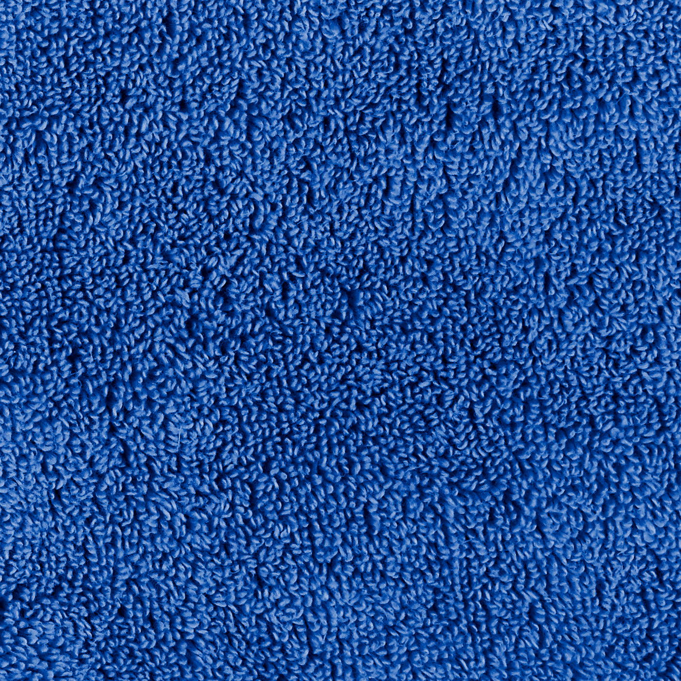 Close-up of cobalt blue terry loop pile texture on Matouk Milagro bath sheet.