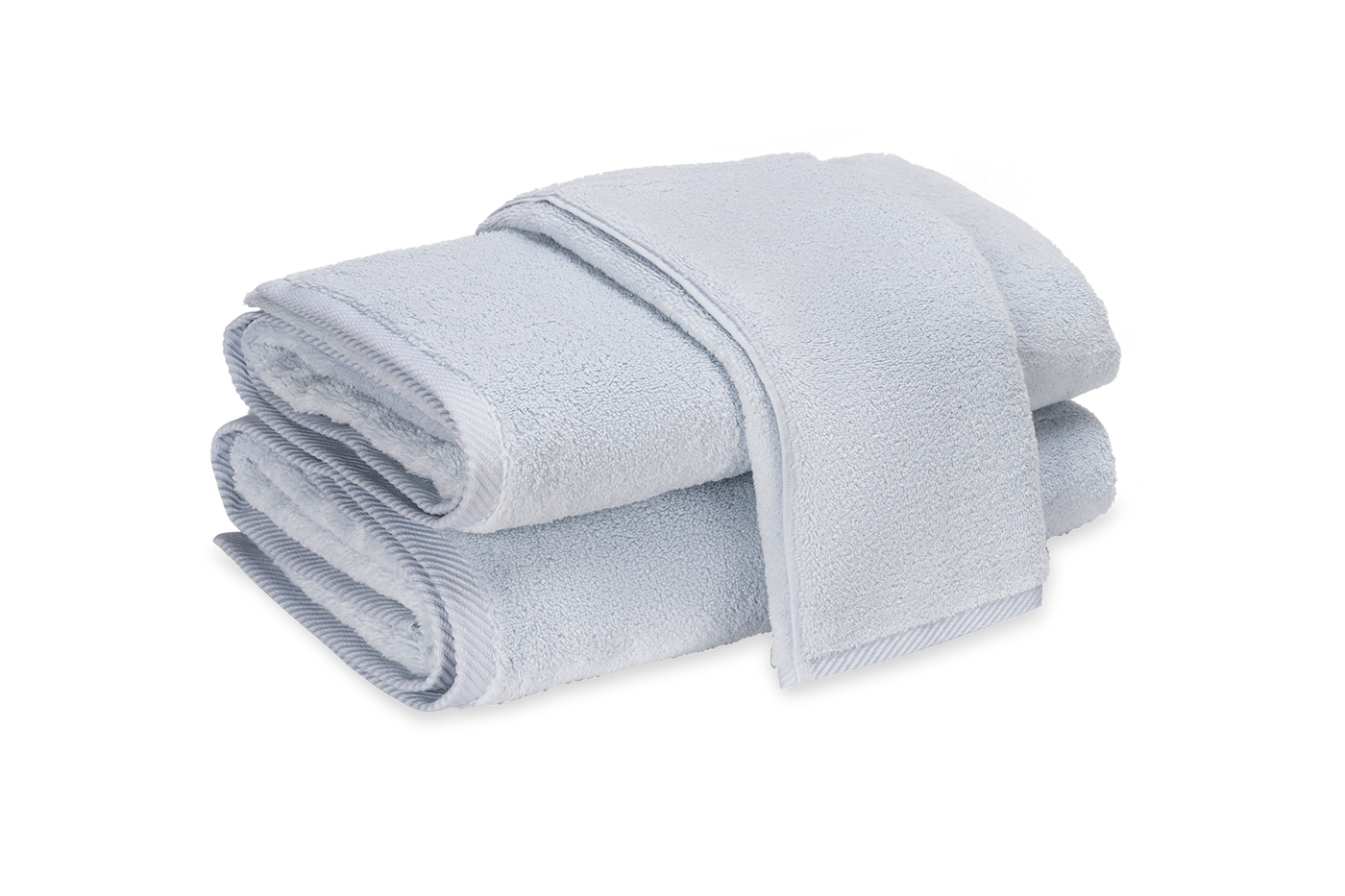 Close-up of folded powder blue Matouk Milagro bath sheet stack with dobby border detail.
