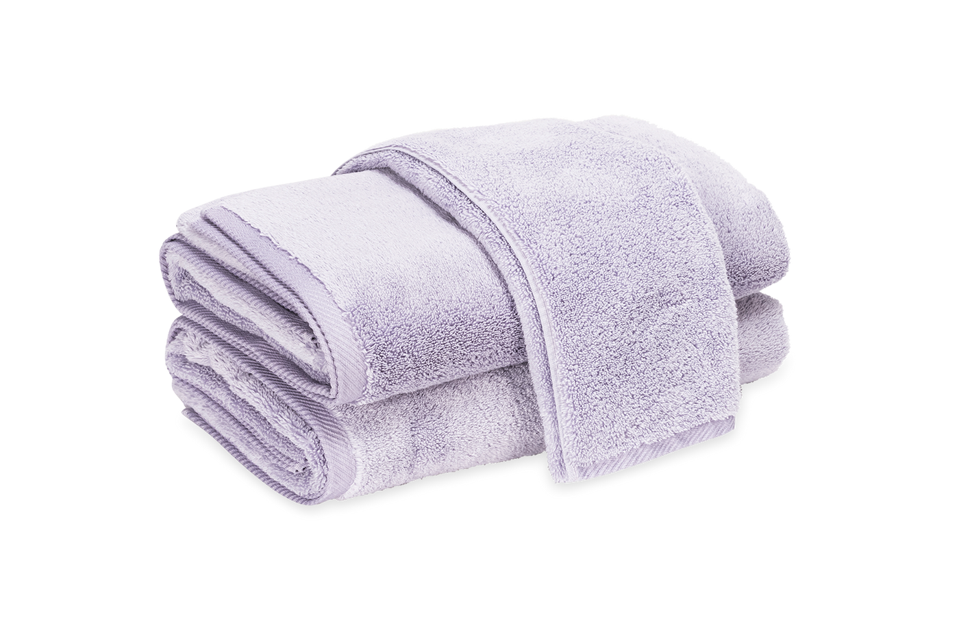 Close-up of folded lavender Matouk Milagro bath sheets stacked on white background.