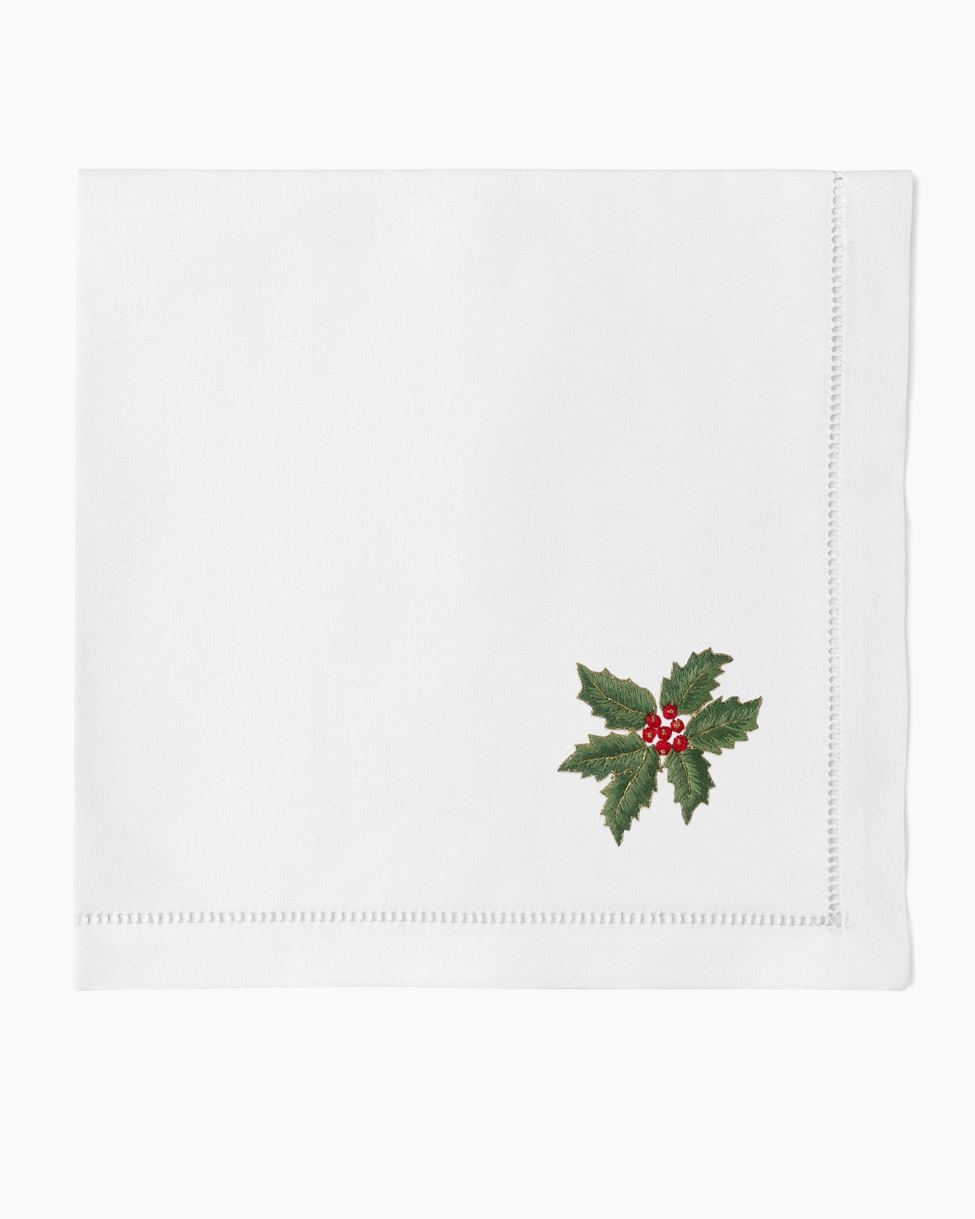 Henry Handwork white linen napkin with embroidered holly and berries, hemstitch border.