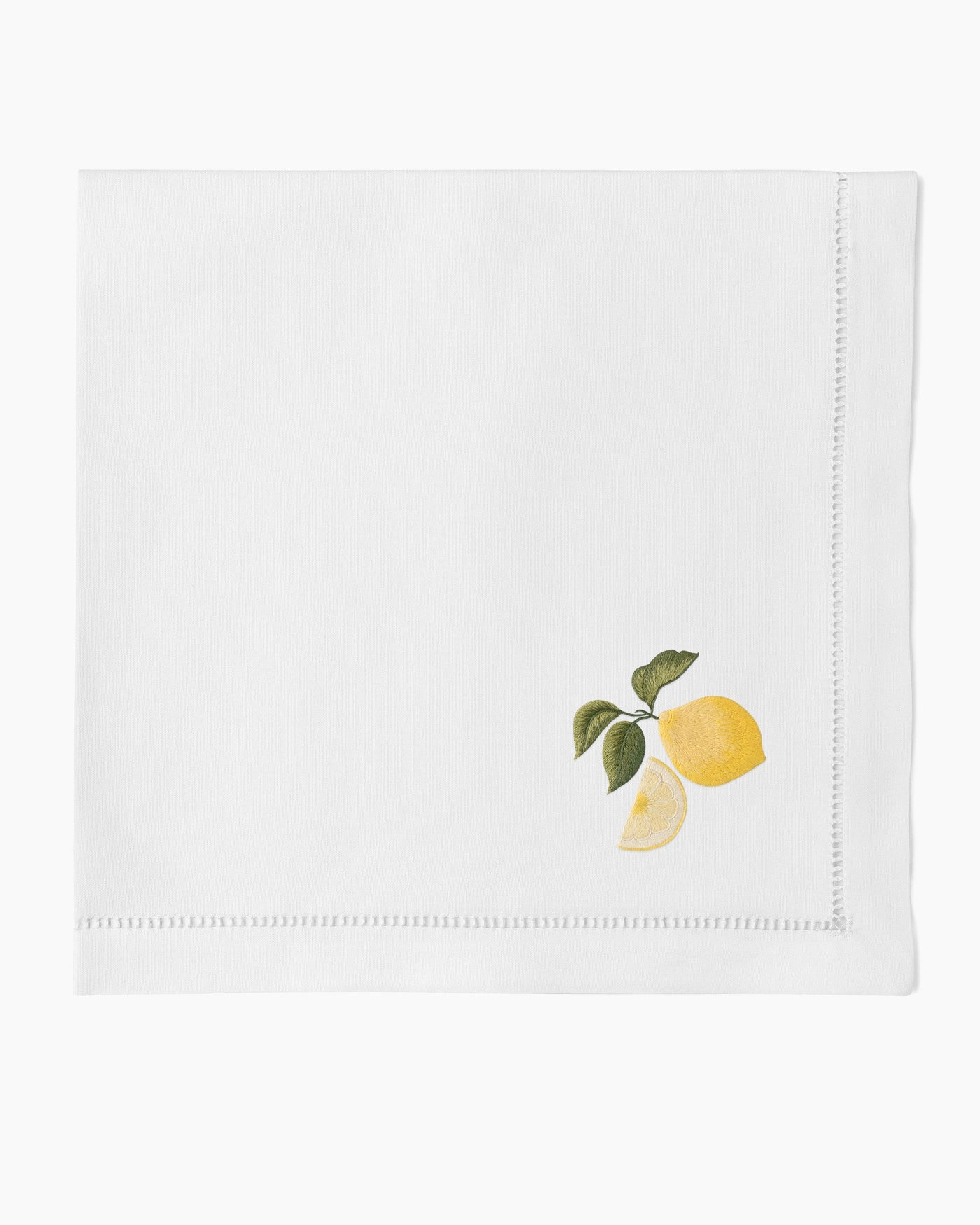Henry Handwork Lemons white linen dinner napkin with embroidered lemon motif and hemstitch border.