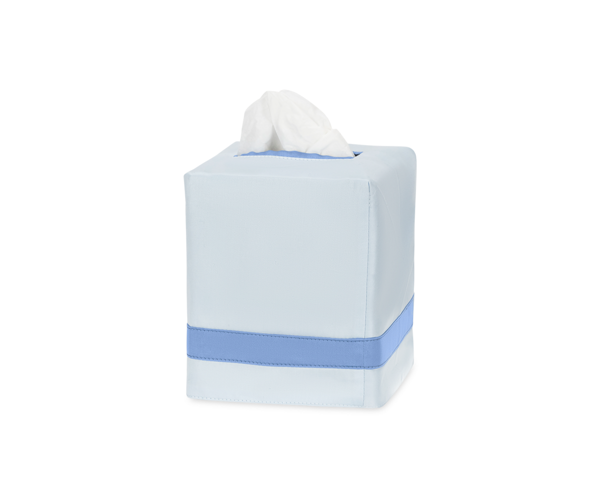 The Nocturne | Tissue Box Cover by Matouk is a square cover crafted in light blue fabric with a darker blue horizontal band, adding an elegant touch to your home while keeping tissues neatly accessible.
