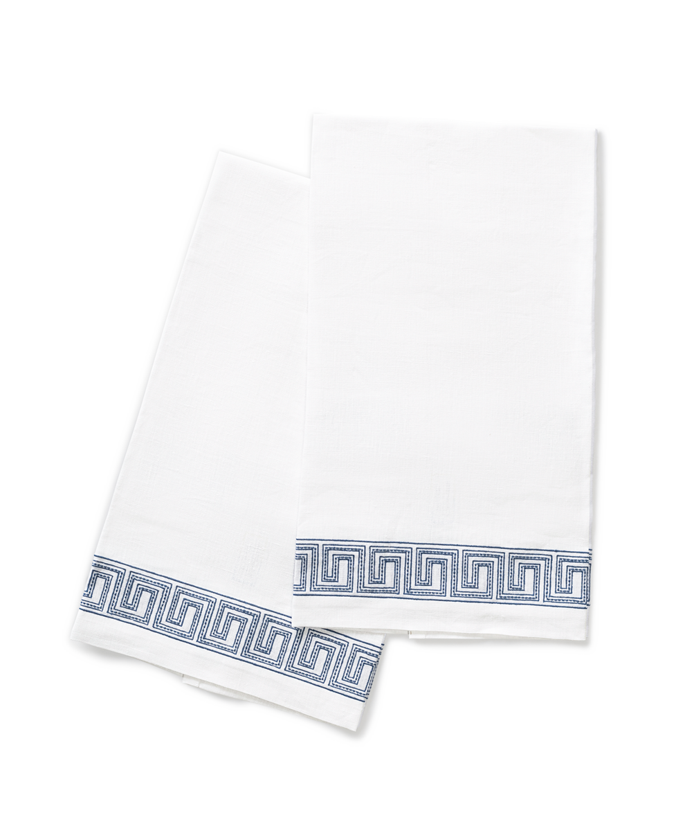 The Ophelia | Embroidered Guest Towel Set by Matouk includes two white towels with a blue Greek key border, neatly folded and overlapping on a white background, evoking the refined elegance of luxury bathroom decor.