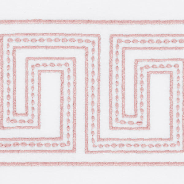 The Matouk Ophelia Shower Curtain features a light pink geometric Greek key embroidery on white linen.