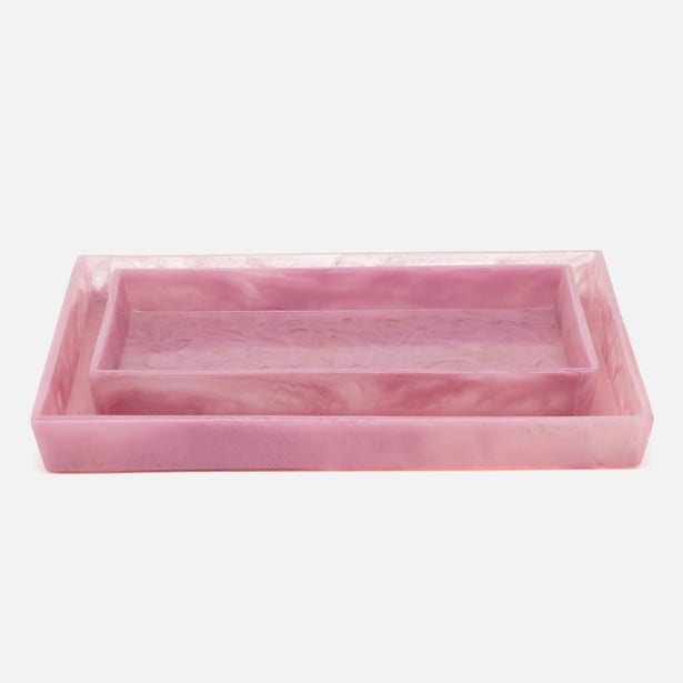 Pink marble-resin Abiko nesting trays stacked, showing swirled pattern on light grey background.
