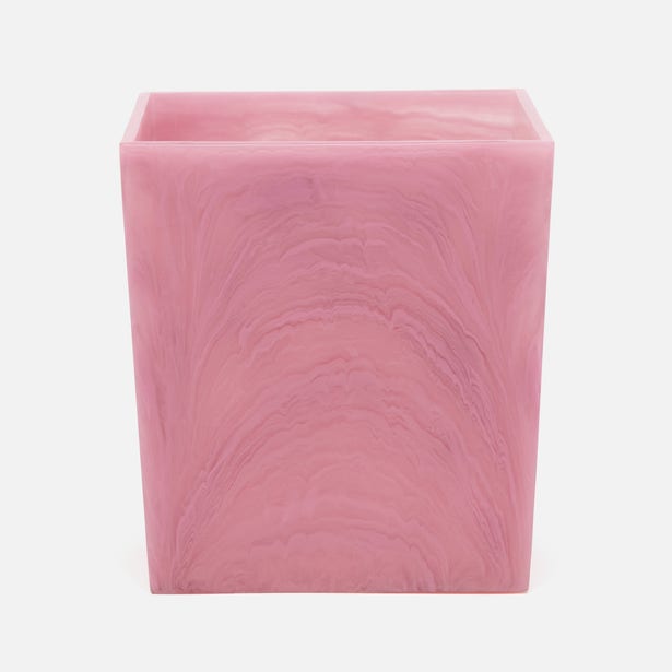 Pigeon & Poodle Abiko wastebasket in pink marbled resin, close-up front view.