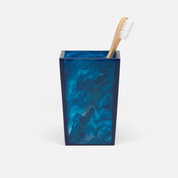 Pigeon & Poodle Abiko brush holder in navy blue marbled resin with bamboo toothbrush.