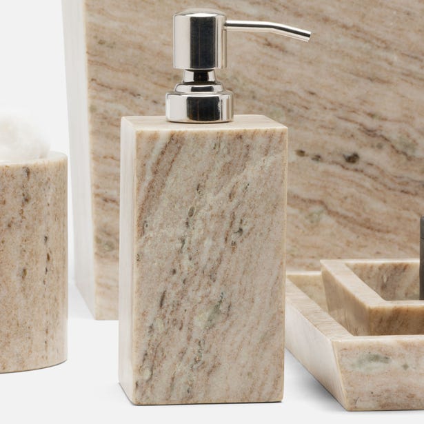 Pigeon & Poodle Athlone travertine bathroom accessories set with soap pump in foreground.