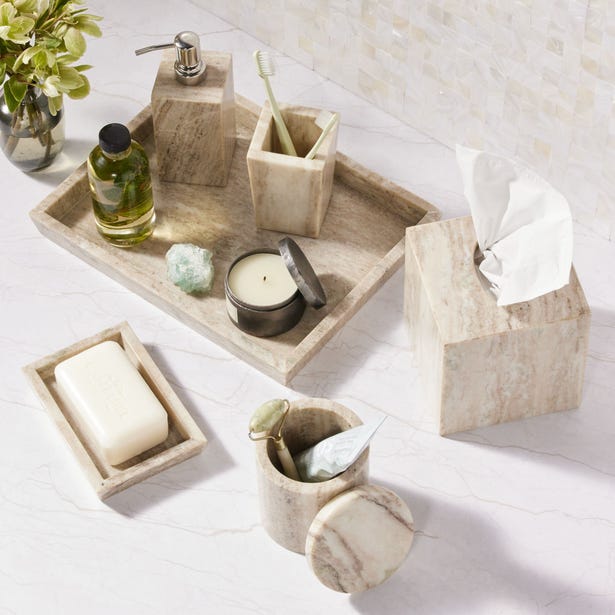 Pigeon & Poodle Athlone travertine soap dish styled with matching bathroom accessories.