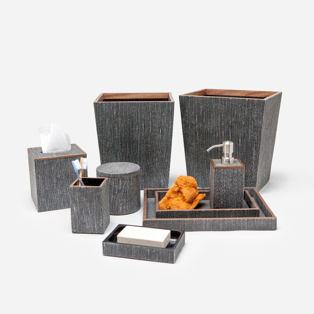 Bruges bathroom accessories set in charcoal grasscloth with copper trim detailing.