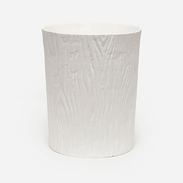 Pigeon & Poodle Burma wastebasket in white with embossed wood grain texture.
