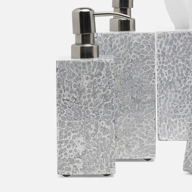 Silver mosaic-textured bath accessories with polished nickel pumps, close-up detail view.