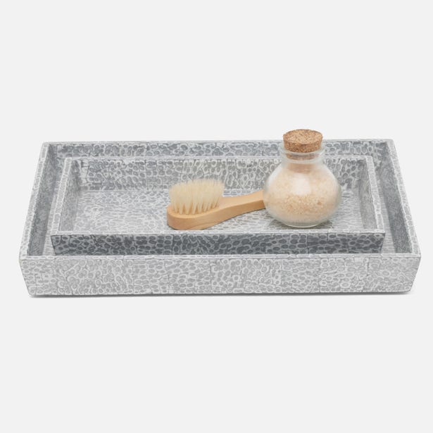 Pigeon & Poodle Callas nesting tray set in silver crackle finish, styled with brush and bath salts.