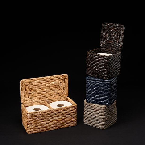 Close-up of stacked Pigeon & Poodle Camden rattan toilet paper holders in dark tones beside open honey holder.