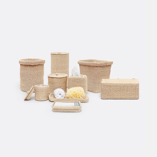 Pigeon & Poodle Chelston woven jute bathroom accessory set styled with natural bath accessories.