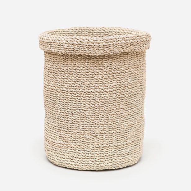 Pigeon & Poodle Chelston wastebasket in ivory woven texture, cylindrical form on white background.