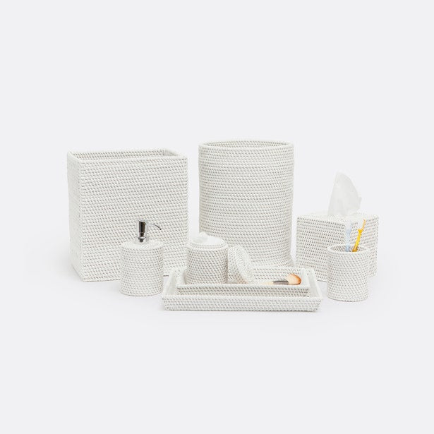 Pigeon & Poodle Dalton white woven rattan bathroom accessories set styled together.