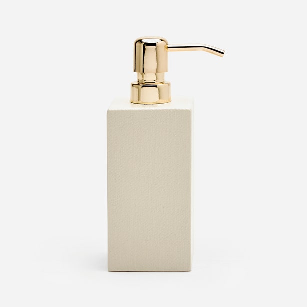 Pigeon & Poodle Dannes soap pump in ivory with gold-tone pump dispenser.