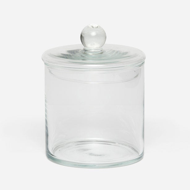 Clear glass Darby bath canister with flat lid and spherical knob handle.