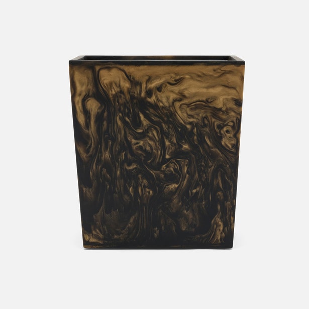 Pigeon & Poodle Duluth wastebasket close-up showing dark bronze marbled resin swirl pattern.
