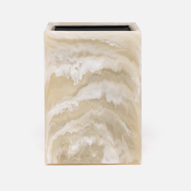 Pigeon & Poodle Duluth wastebasket, close-up of alabaster marbled resin exterior.