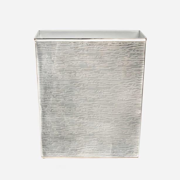 Pigeon & Poodle Elgin wastebasket in silver with embossed linear texture, front view.