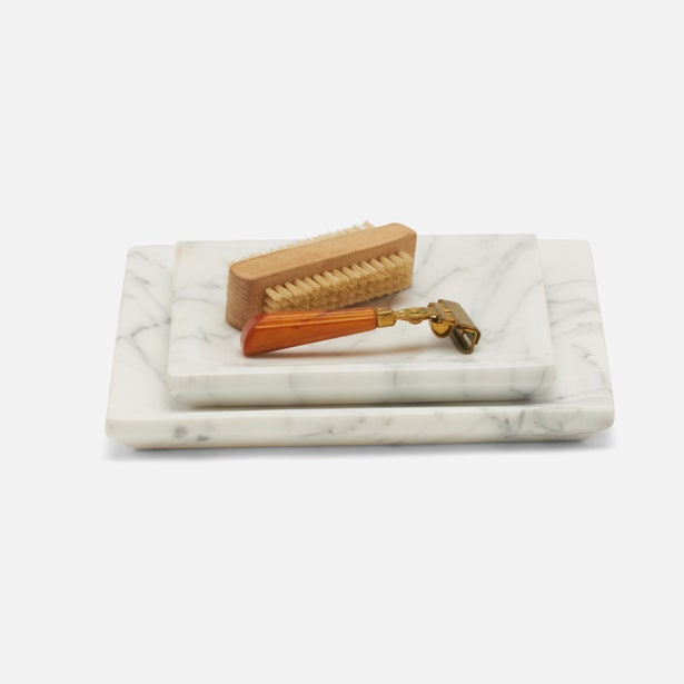 Pigeon & Poodle Elyria white marble nesting tray set styled with brush and razor.
