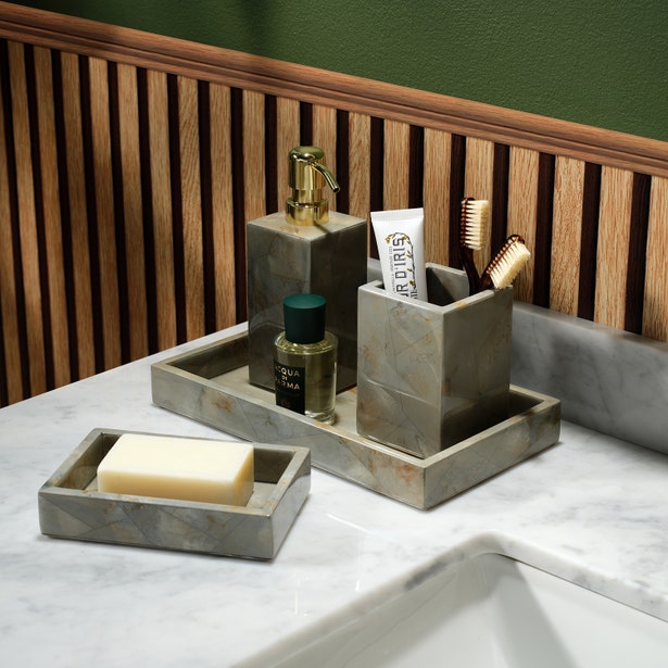 Pigeon & Poodle Gorman grey geometric stone bath accessories styled on marble countertop.