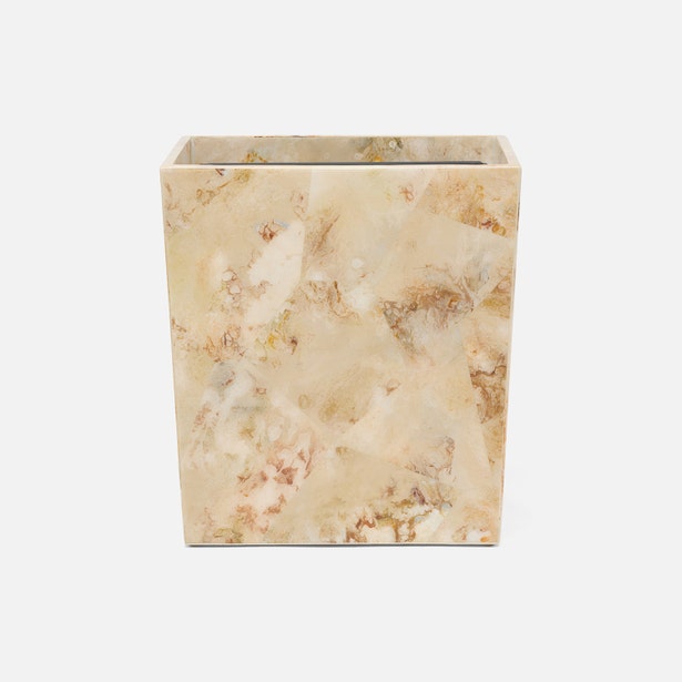 Pigeon & Poodle Gorman wastebasket in cream and amber marbled resin, front view.