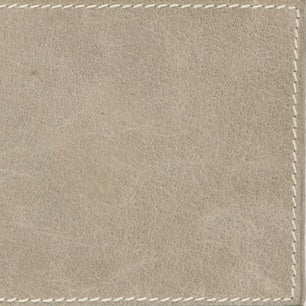 Close-up of taupe leather-textured surface with stitched border detail on Hampton bath canister.