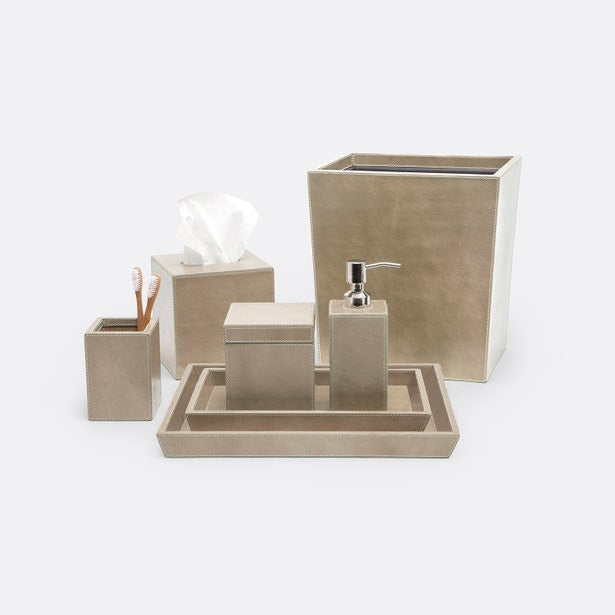 Close-up of Pigeon & Poodle Hampton bath accessories set in taupe with silver pump detail.