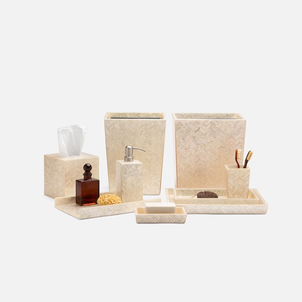 Ivory herringbone-textured brush holder styled with matching Handa bathroom accessories set.