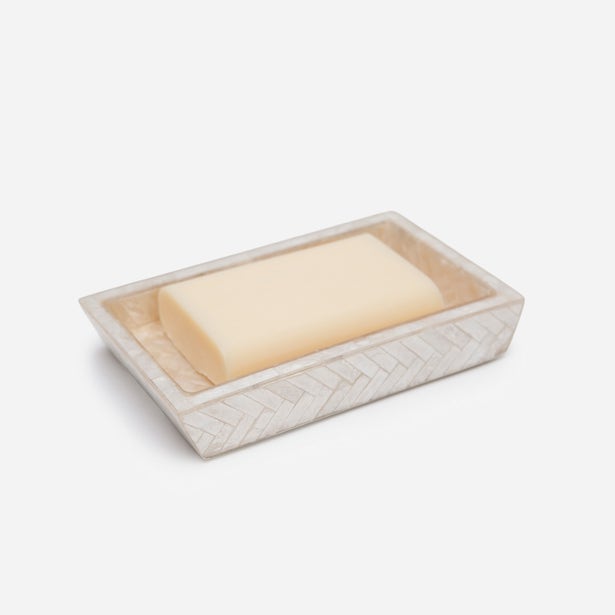 Pigeon & Poodle Handa soap dish in white with herringbone texture holding a bar of soap.