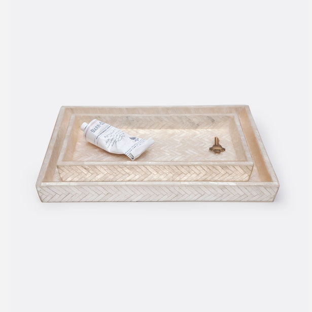 Pigeon & Poodle Handa nesting tray set in ivory herringbone bone inlay, styled with cream and brass accents.