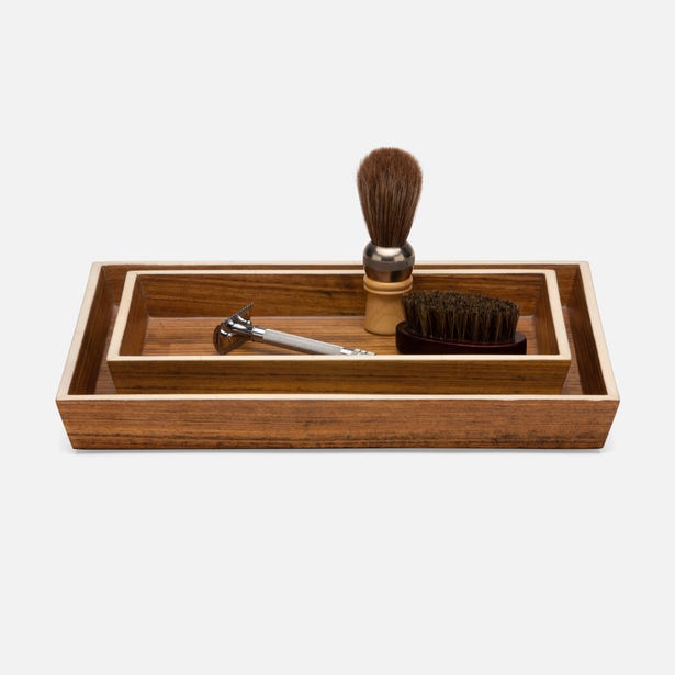 Pigeon & Poodle Harper nesting tray set in walnut wood with brass inlay, styled with shaving accessories.