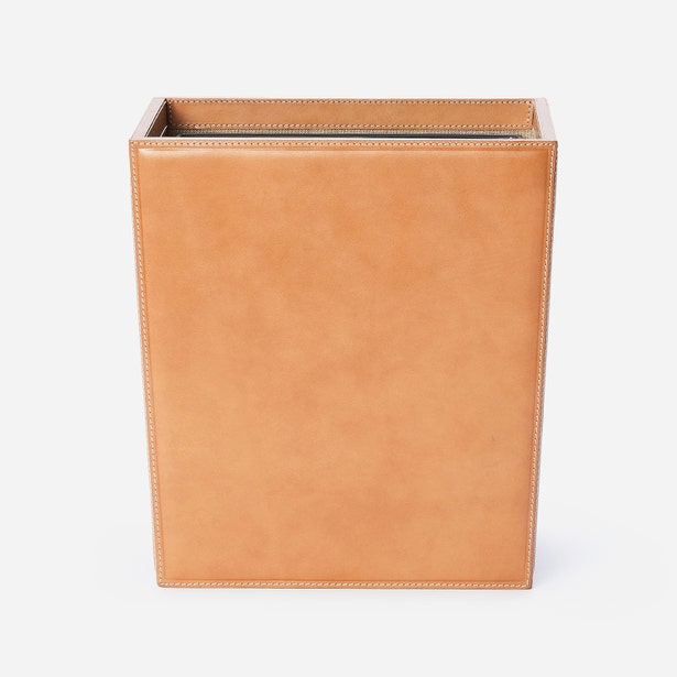 Pigeon & Poodle Lorient wastebasket in tan leather with contrast stitching, front view.