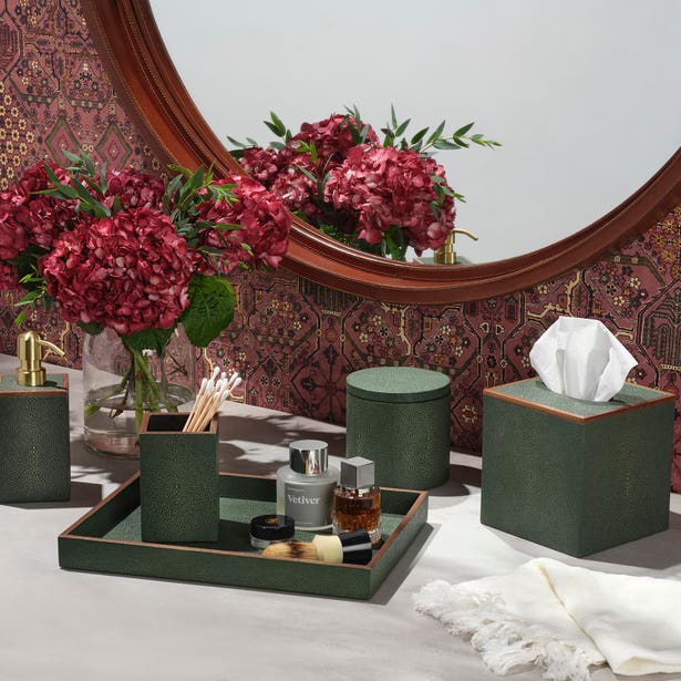Forest green faux shagreen bath accessories set styled on vanity with hydrangeas.