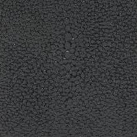 Close-up of charcoal textured surface detail on Pigeon & Poodle Manchester bath canister.