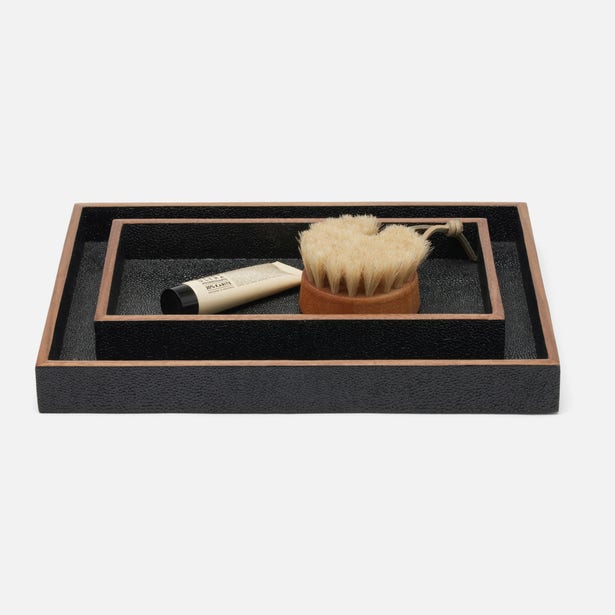 Pigeon & Poodle Manchester nesting tray set in black with copper trim, styled with bath accessories.