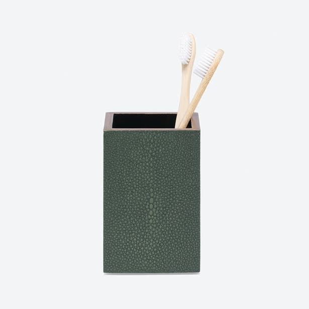 Manchester brush holder in forest green shagreen texture with two bamboo toothbrushes.