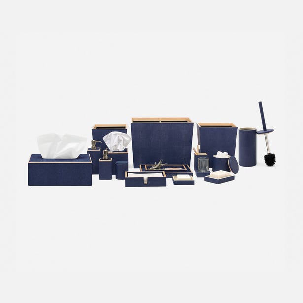 Navy blue and gold-trimmed Manchester bathroom accessory collection arranged on white background.