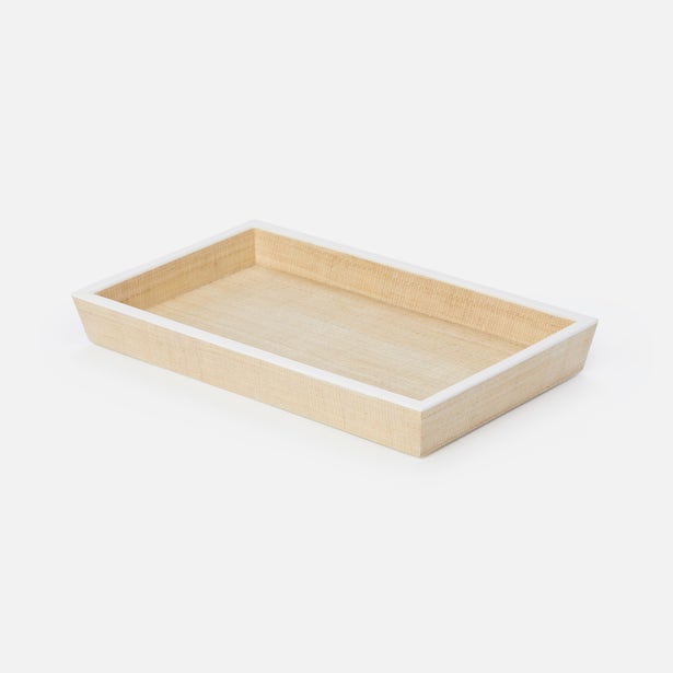 Pigeon & Poodle Maranello tray in natural raffia with white lacquer trim, angled view.