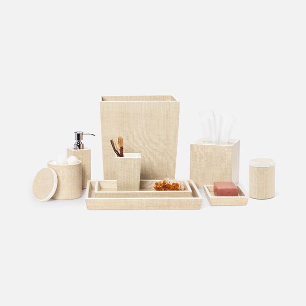 Maranello collection in natural raffia: brush holder among full bathroom accessory set.