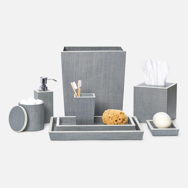 Maranello collection displayed as full grey linen-wrapped bathroom set with tray and accessories.