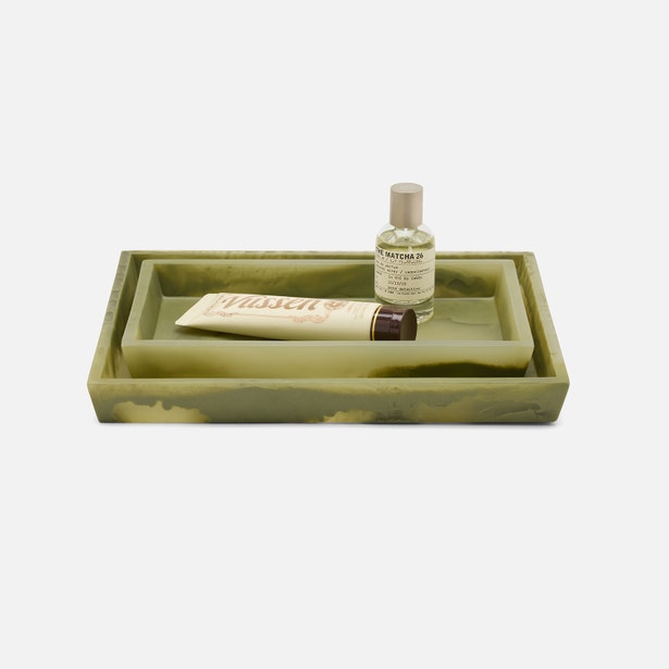 Pigeon & Poodle Novo nesting tray set in green marble resin, styled with beauty products.