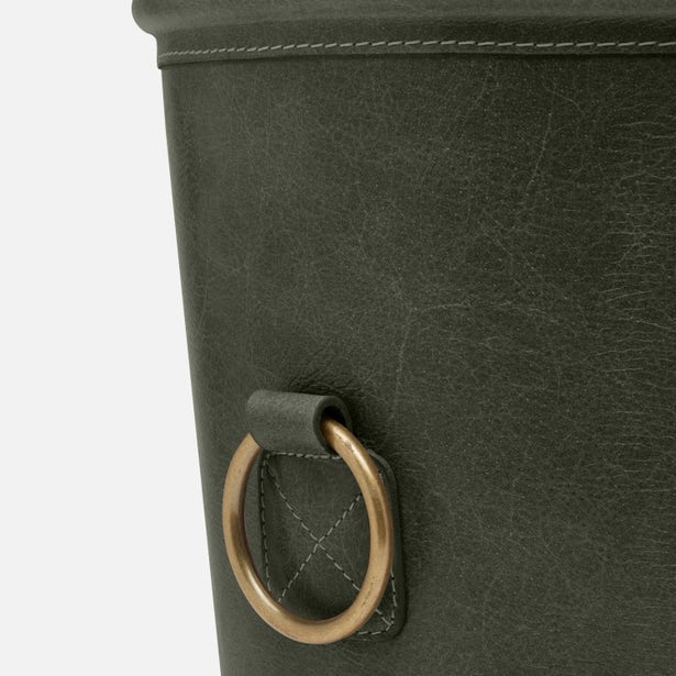 Close-up of Pigeon & Poodle Ogden wastebasket brass ring handle on olive leather.
